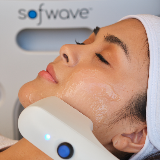 Woman enjoying her Sofwave treatment